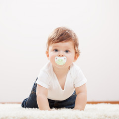 Cute baby boy crawling