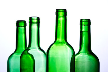 Green wine bottles transparent on white background.