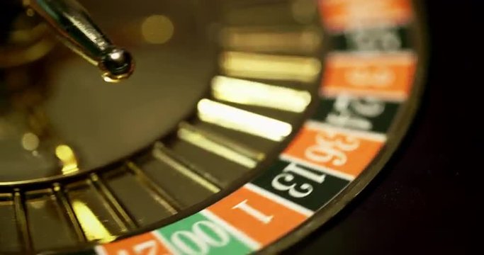 Croupier Spinning Roulette Wheel. Roulette is classic casino game.  Shoot on Digital Cinema Camera in 4K - ProRes 422 HQ codec.