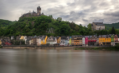 Fototapeta na wymiar Colorful houses in front of Cochem castle, Moselle, Germany