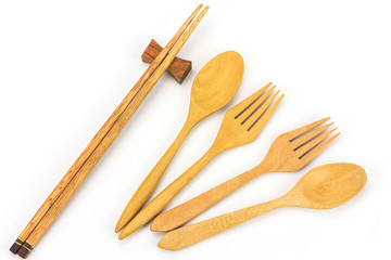 Assorted wooden tableware on white background