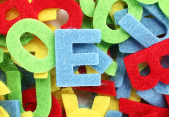 Colorful cut letters for textile decoration