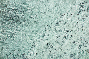 Natural green mineral smooth surface texture.