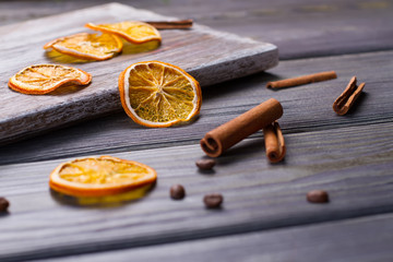 Sliced dried orange with cinnamon.
