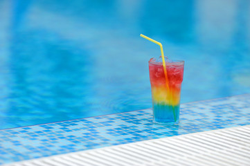 Cocktail at the edge of the swimming pool