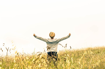 boy expresses his freedom in the countryside - lifestyle concept