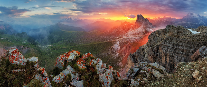 Fototapeta Panorama dramatic sunset in dolomites alp mountain from peak Nuv