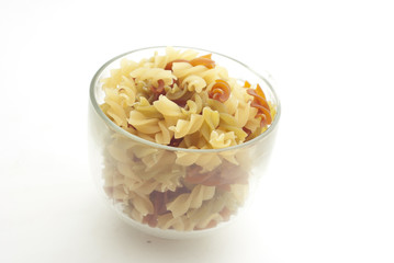 colored pasta on white background