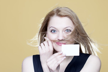 Girl with blank business card