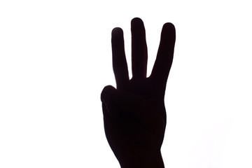 Black contrast hand showing numbers with fingers.