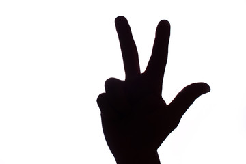 Black contrast hand showing numbers with fingers.