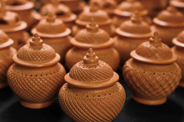 Collection of earthenware in a row.