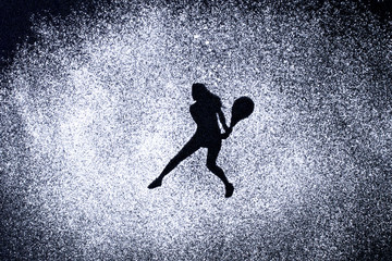 sport concept, shape of woman in action by powder. Part of a ten