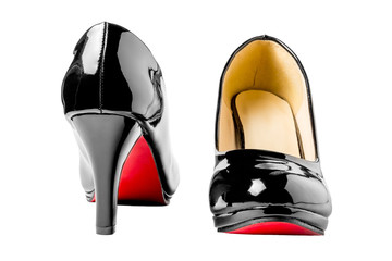 Black patent leather shoes close-up isolated