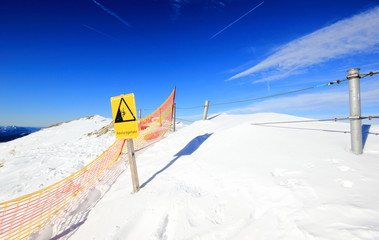 Risk of falling! 
The Nebelhorn Mountain in winter. Alps, Germany.