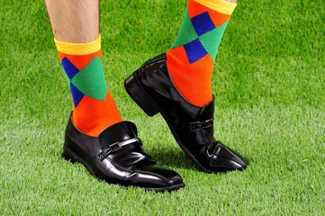 Fototapeta premium カラフルな靴下とビジネスシューズ
