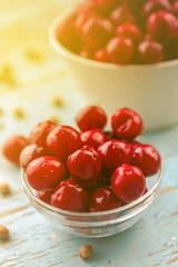 Sweet Cherry in Bowl on Rustic Table