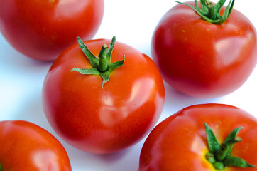Fresh tomato on white background