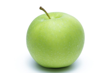 Green apple with dew  on white background