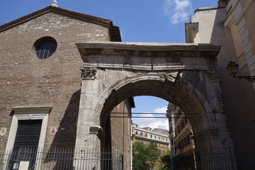 Fototapeta na wymiar Triumphal Arch of Gallienus and the church of San Vito Rome Italy