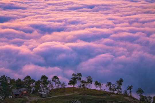 Life above the clouds / View on the Nagarkot Village (2,100 m) with the sea of clouds behind the hill. 