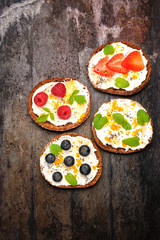 Bruschetta with cream cheese, fresh berries, chia seeds and honey. Super Foods