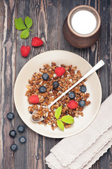 Chocolate granola and fresh berries