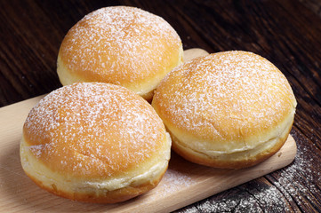Three sugary donuts