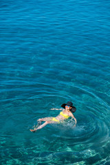 Woman swimming in the sea