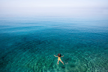 Woman swimming in the sea