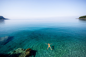Woman swimming in the sea