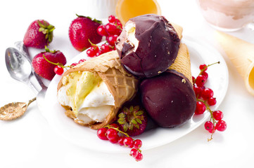 ice cream conewith fresh berries