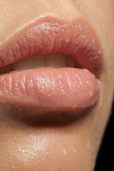 close-up of lips with drops of water