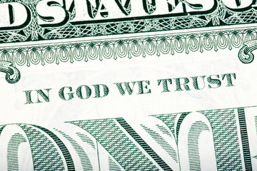 Dollar macro, stacked close-up detail photo. In God we trust sen © Dmytro Synelnychenko