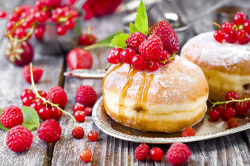 Morning breakfast with mini donuts and berries