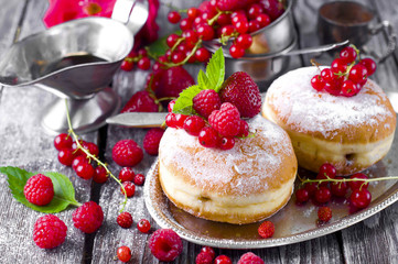 Morning breakfast with mini donuts and berries