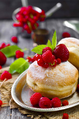 Morning breakfast with mini donuts and berries