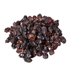 Black dry barberry close-up, isolated on white.