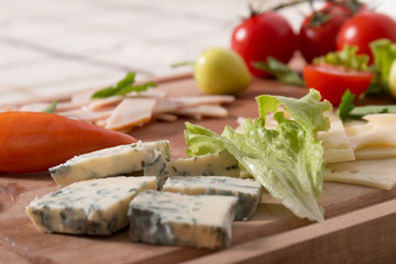 Delicious Meat And Cheese Slices With Tomatoes