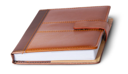 Closed notebook in leather cover rotated
