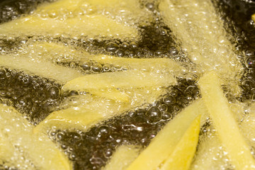 French fries fried in a pan