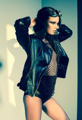 sexy woman model dressed casual, posing in the studio