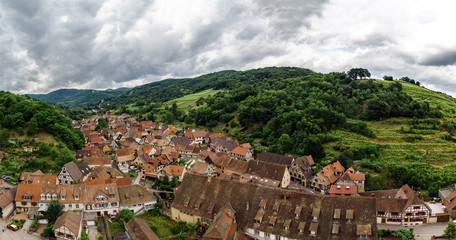 Fototapeta na wymiar Wide panoramic bird-fly view. Alsace hills.