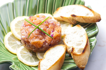 salmon tartar with red onion