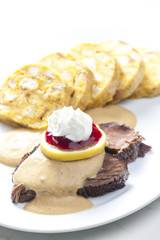 sirloin on cream with dumplings