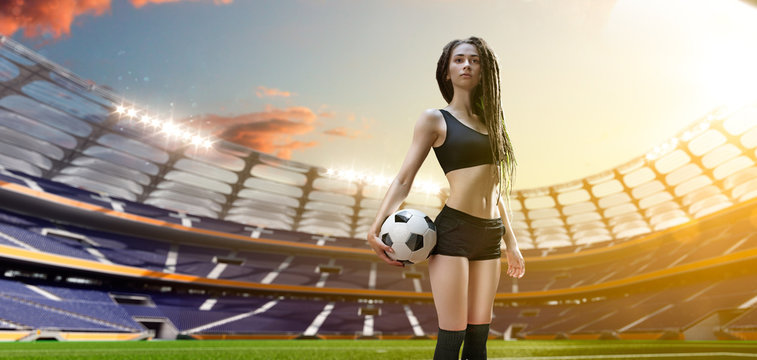 Yong sexy woman player in soccer stadium