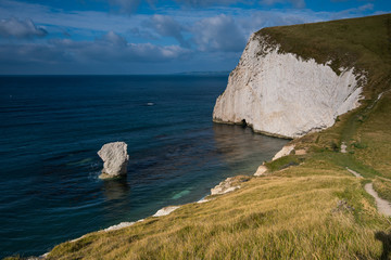 Fototapeta na wymiar White cliffs in Jurassic Coast beach in Dorset, UK