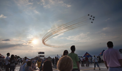 AIRSHOW, ROMANIA JUNE 20TH: AIR FORCES PERFORMING AEROBATIC EXERCISE  - obrazy, fototapety, plakaty