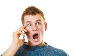 Young man talking on mobile cell phone