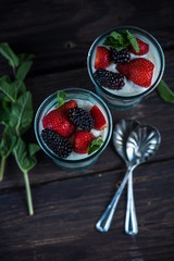 Homemade parfait with fresh berries and cream